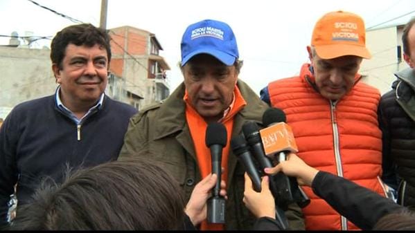 Elecciones 2015: Scioli de campaña con Aníbal Fernández y Julián Domínguez